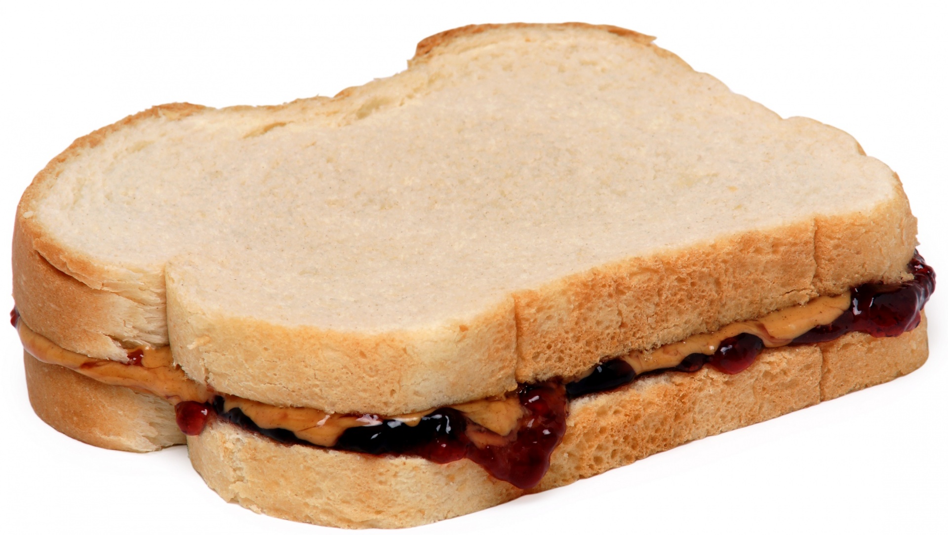 A peanut butter and jelly sandwich with a white background.